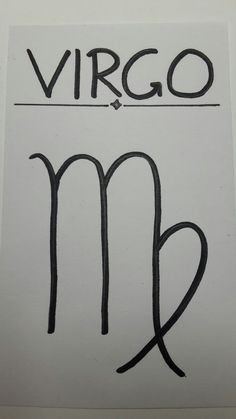 the zodiac sign virgo is drawn on a piece of paper with black marker writing