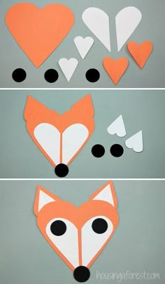 paper cut out to look like a fox's head with hearts and arrows on it