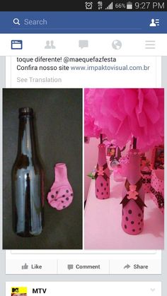 there are pink decorations and wine bottles on the table, and one is decorated with polka dots