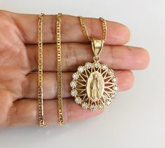 "18K GOLD FILLED GUADALUPE NECKLACE 16\" LONG...FOR GOOD LUCK ,PROSPERITY AND PROTECTION. PENDANT : 38 mm X 25 mm 18K GOLD FILLED CADENA DE GUADALUPE 16\" LARGO ..PARA PROSPERIDAD, BUENA SUERTE Y PROTECCION. DIJE: 38 mm X 25 mm" Mary Guadalupe, 14kt Gold Jewelry, Jewelry Mexican, Protection Pendant, Pendant Necklace Silver, Mexican Jewelry, For Good Luck, Dope Jewelry