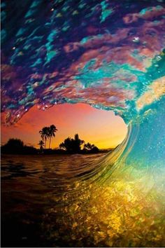 an image of the inside of a wave with stars and palm trees in the background