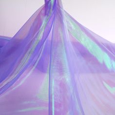 All colors of this fabric here- https://www.etsy.com/listing/799226054/bright-shiny-iridescent-color-sheer Bright Shiny Iridescent color voile organza fabric for dress making 60 inch - sold by the yard Composition: 100% Polyester  Weight: 40 gsm  (Gram per Square Meter) Stretch:  Non The width of fabric: 60 inch / 150cm  The length of fabric: by the Yard (91.5 cm)  If you purchase multiple yards a color, we will send them in a piece continuous Holographic Film, Purple Holographic, Iridescent Fabric, Iridescent Color, Diy Clothes Design, Organza Fabric, Fairy Costume, Star Dress, Tulle Fabric