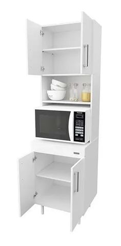 a white microwave oven sitting inside of a cabinet