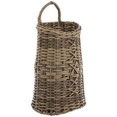 a large wicker basket with handles on the front and side, in grey tones