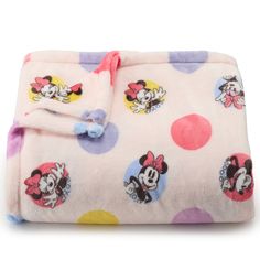 a minnie mouse blanket with polka dots on it