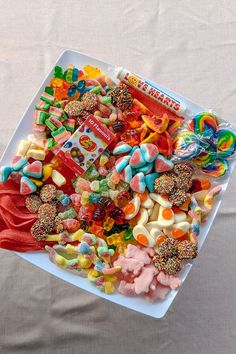 a white plate topped with lots of candy