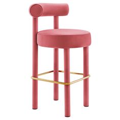 a pink stool with gold legs and a round back rest on an isolated white background