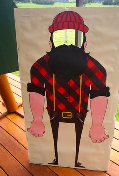 a paper bag with a drawing of a man wearing a red hat and plaid shirt