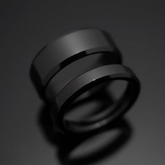 two black rings sitting on top of each other