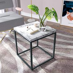 a living room scene with focus on the coffee table and plant in the centerpiece