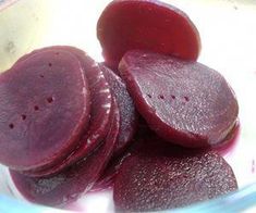 sliced beets in a glass bowl ready to be cooked