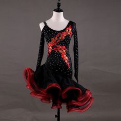 a black and red dress on a mannequin