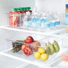 an open refrigerator filled with lots of different types of fruits and vegetables in plastic containers