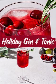 a holiday gin and tonic cocktail with cherries