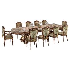 a dining room table and chairs with an ornate design