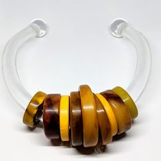 This Is An Absolutely Amazing Vintage Necklace! It Is A Modernist Collar With An Exquisite Design. The Beads Are Bakelite - Different Earth Tone Colors - While The Collar Is Clear Lucite. I Have Never Seen Another Quite Like This One. Vintage Bakelite Jewelry, Retro Bakelite Jewelry, Handmade Retro Bakelite Jewelry, Luxury Vintage Bakelite Jewelry, Bakelite Necklace, Bakelite Jewelry, Earth Tone Colors, Vintage Bakelite, Collar Necklace