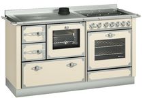 an old fashioned white stove with two ovens