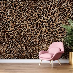 a leopard print wallpaper with a pink chair and potted plant in the corner