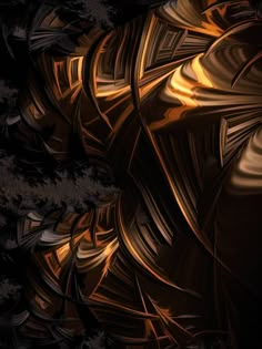 an abstract photo with gold and black colors on the image is made up of wavy lines