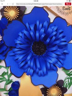 an image of blue paper flowers on display