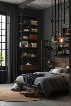 an industrial bedroom with black walls and flooring is furnished with gray linens, dark wood furniture and large windows