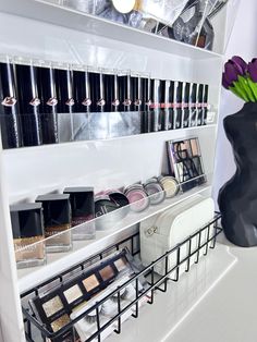 AS Designs Wall Makeup Organizer! Holds 30+ nail polish. 50+ brushes and almost any other makeup/beauty products or accessories you may have. Black wire basket included. The wall unit measures 28.75 inches in height. 16.5 inches width and 5 inches depth. This item can sit on a countertop or hanging on the wall. Perfume Display and brush holder in separate listing. Please visit my shop if interested. Please contact me if international shipping is needed. Please contact me with any questions. Thank you. Makeup Wall Storage, Wall Makeup Storage, Wall Makeup Organizer, Salon Makeup Station, Makeup Shelf, Black Wire Basket, Makeup Shelves, Room Revamp, Perfume Storage