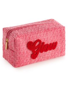 Carry all your odds and ends in glowing style with Shiraleah's “Glow” Zip Pouch! This compact cosmetic case is the perfect size to store makeup, jewelry, and anything else you might need to keep in one place this holiday season. Made from trendy tweed fabric in a vibrant pink color with a subtle sparkle of lurex thread, the pouch features the word “Glow” embroidered across the front in festive red lettering. Pair with other items from Shiraleah's Merry Everything Collection to complete your look Spa Wraps, Accessories Display, Odds And Ends, Tweed Fabric, Framed Gifts, Zip Pouch, Frame Decor, The Pouch, Cosmetic Case