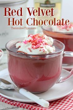 red velvet hot chocolate with whipped cream and sprinkles