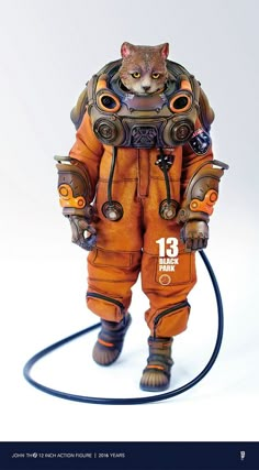 a cat in an orange space suit with a hose attached to it's chest