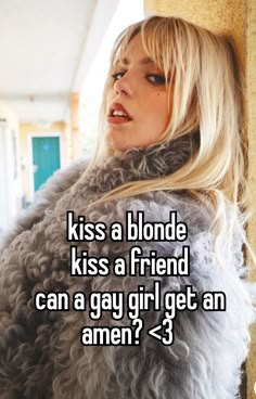 a woman with long blonde hair wearing a fur coat and text that reads, kiss a blonde