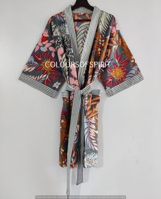 These cotton floral Print Robes are luxurious and sweet robes , and will make you and your bridesmaids feel like you're blossoming flowers and unique print ! This Robe we makes from 100% Cotton printed fabric . The fabric print is Floral Print which is very popular in all over the world . These robes are perfect for bridesmaids gifts, birthday gifts, and perfect gifts for girls who are in college. A beautiful lightweight cotton kimono-style hand-printed dressing gown. The gown is 100 cms / 39 " Gown Indian, Bridal Kimono, Kimono Floral, Mode Kimono, Printed Robe, Floral Gown, Floral Robes, Cotton Kimono, Bridesmaid Robes