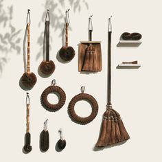 an assortment of brown items displayed on a white surface