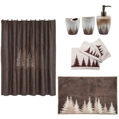 bathroom accessories including shower curtain, toilet paper holder and bathtub cover with trees on it