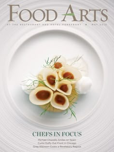 the cover of food arts magazine features an image of some appetizers on a plate