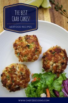 three crab cakes on a plate next to a salad