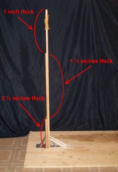 an image of a wooden pole with measurements for the top and bottom sections on it