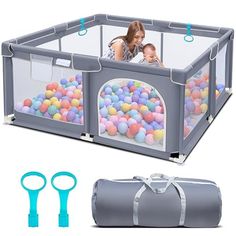 an inflatable playpen with ball pit and accessories