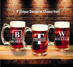 three beer mugs sitting on top of a wooden table next to a brick wall