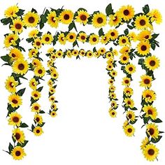 a bunch of sunflowers that are hanging from a trellis on a white background