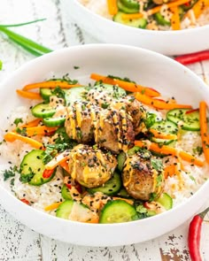 two white bowls filled with meatballs and veggies on top of rice covered in sesame seeds