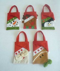 four small bags with christmas decorations on them