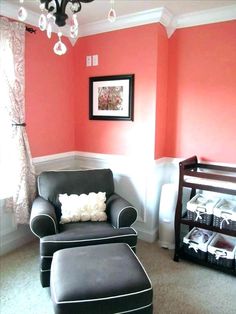 the room is painted in coral and gray