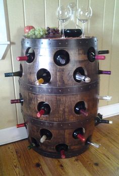 a wine rack made out of an old barrel