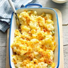 a casserole dish with broccoli and cheese