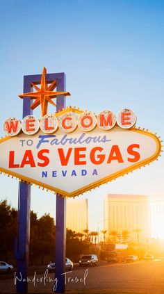 the welcome sign to las vegas is lit up