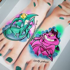 two feet with cartoon tattoos on them