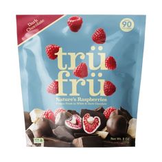 a bag of trai fru with raspberries and chocolates on it