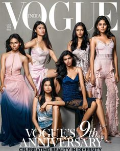 four women in evening gowns on the cover of an issue of v & g magazine