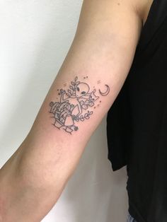 a person with a tattoo on their arm