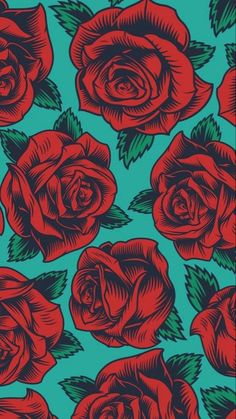 red roses on blue background with green leaves